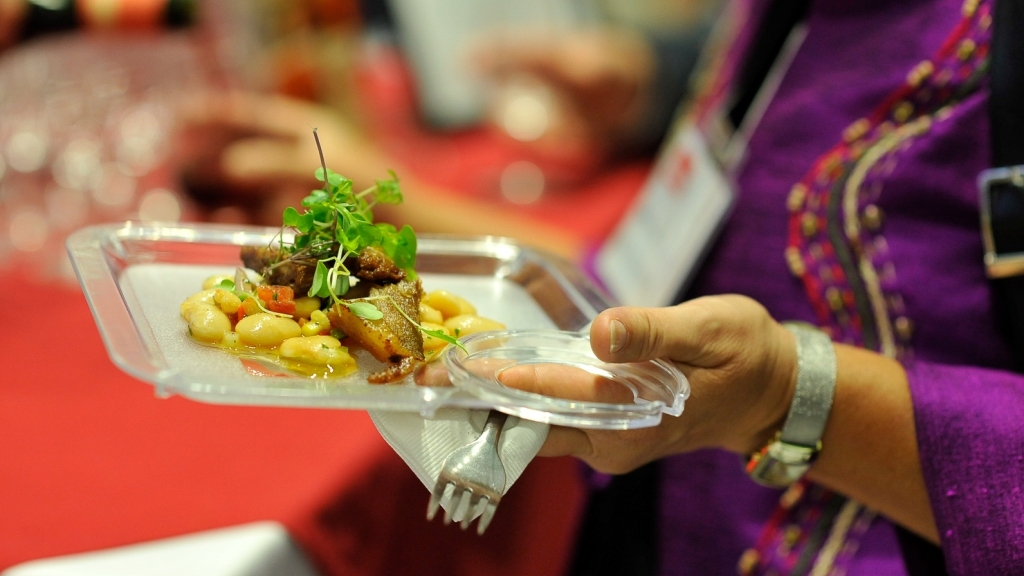Fine Food, Fine Wine, Fine Art A Brock alumni shows off one of the food creations at Fine Food, Fine Wine, Fine Art