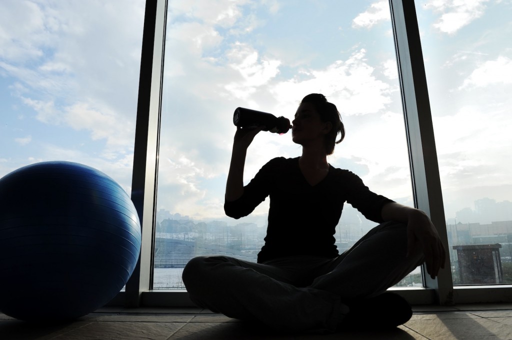 Fitness sporty girl silhouette excercising and drinking a water The Brock Wellness Committee kicks off its fitness challenge Monday.